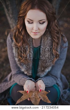 Absolutely Beautiful Lady Woman With Brunette Hair Deep Blue Eyes Pink Cheeks And Rose Pout Lips Sit