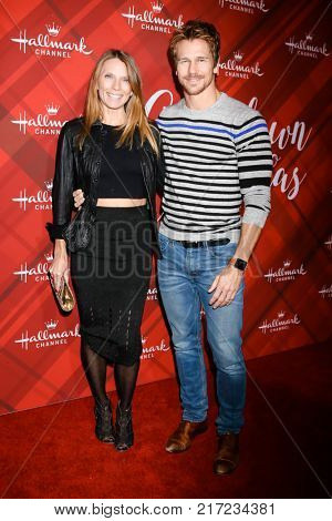 LOS ANGELES - DEC 4:  Charity Walden Joiner, Rusty Joiner at the Christmas At Holly Lodge Screening at 189 The Grove Drive on December 4, 2017 in Los Angeles, CA