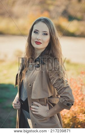 Sexy Amazing Lady Girl Nifty Stylish Dressed In Autumn Jacket With Blond Hairs And Pout Red Lips Wit