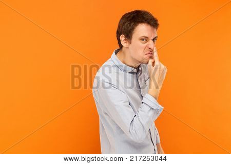 Liar Man Touching Nose And Looking At Camera