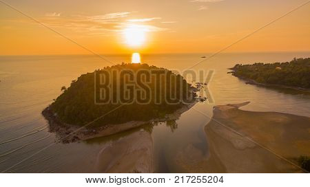 stunning sunset at Kala island. Layan beach and Bangtoa beach is the same beach the left side is Bangtoa beach the right side is Layan beach in the end of Layan beach has Kala island