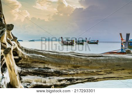 long tailed boat fishing boat motor boat on the sunrise scene