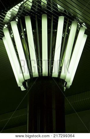 Rectangular lights on a granite column, in a circle,