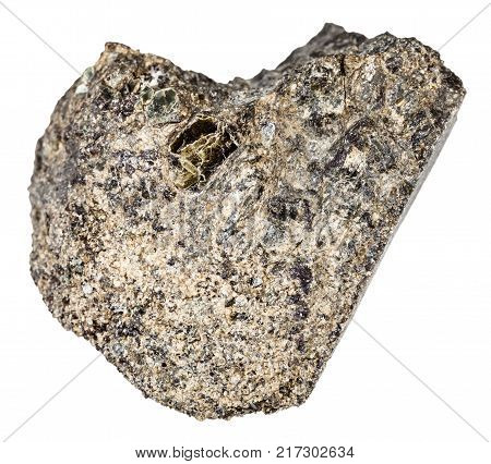 macro shooting of natural mineral rock specimen - raw peridotite stone with Phlogopite mica isolated on white background from Kovdor region, Kola Peninsula, Russia