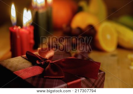 Kwanzaa Holiday Concept With Decorate Seven Candles Red, Black And Green, Gift Box, Pumpkin,corn And