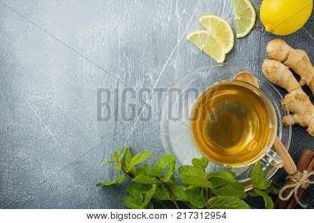 Greek salad in ceramic plate on gray concrete background. Traditional Greek dish. Selective focus.Top view.