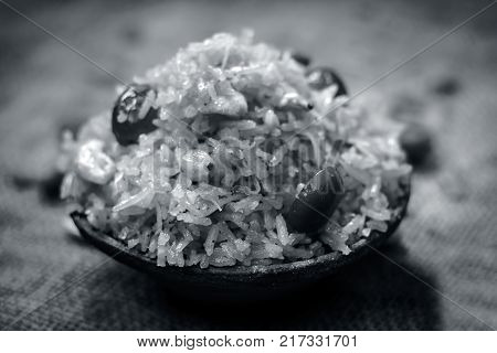 Indian Sweet Rice Dish In A Clay Bowl On Gunny Background.