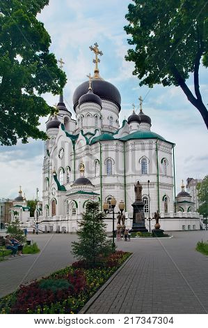 Voronezh Russia - June 11 2016: Annunciation Cathedral (Orthodox Church) and monument to Saint Mitrofan in Voronezh Russia