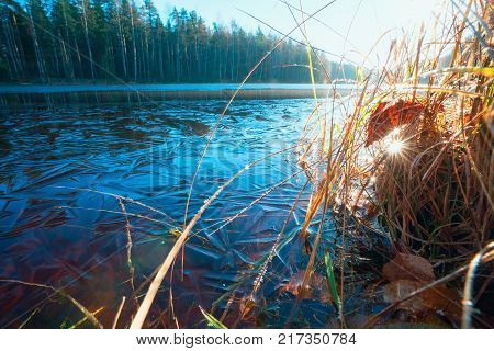 The First Ice On The Lake On A Sunny Day.