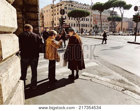 Rome Italy - November 2 2017: fascinating conversation two elderly Italian women on street