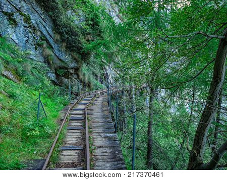 Abandoned railway near Campliccioli Dam in Natural Park of Alta Valle Antrona, Piedmont, Italy