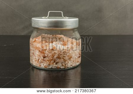 Healthy crystal Himalayan salt in a jar.