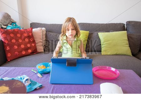 Little Child Playing Parchis Game At Home In Summer