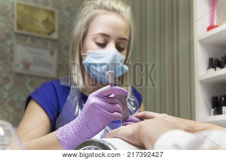 Cute Girl Master Doing A Manicure.