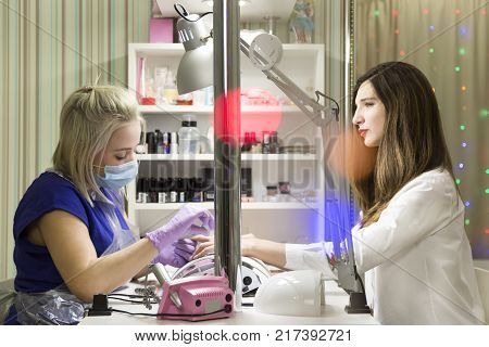 Cute Girl Master Doing A Manicure.