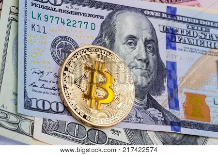 Closeup of golden yellow bitcoin, macro shot. High resolution photo.