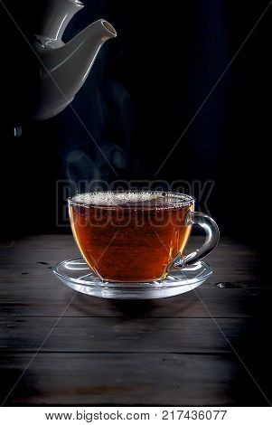 Cup Of Ginger Tea With Lemon And Honey On Dark Blue Background,