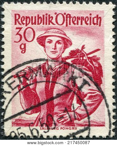 AUSTRIA - CIRCA 1948: A stamp printed in Austria shows a woman in national dress Salzburg Pongau circa 1948