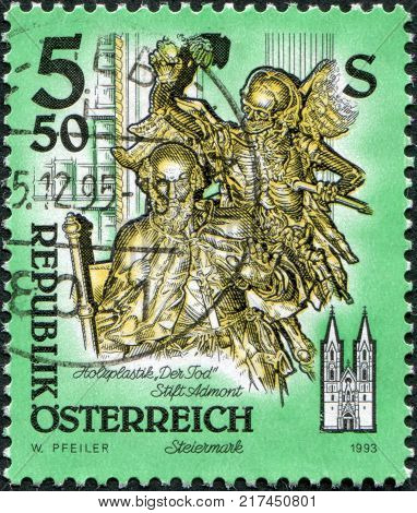 AUSTRIA - CIRCA 1993: A stamp printed in Austria shows Death wooden statue by Josef Stammel (1695-1765) in Admont Abbey (Stift Admont) circa 1993