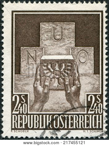 AUSTRIA - CIRCA 1956: A stamp printed in Austria devoted to the accession of Austria to the UN represented Symbolic of Austria's Joining the UN circa 1956