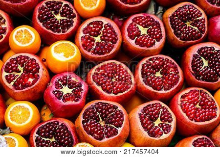 Ripe pomegranate fruit at a market place for sale