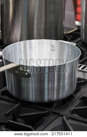 Metal stainless steel pan on a kitchen stove