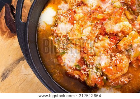 fresh shrimps casserole served with hot spices