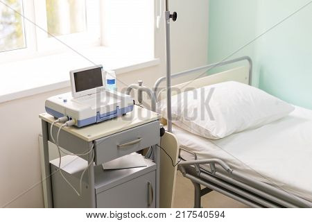 Cardiotocograph device  in a hospital  to examine  fetus heartbeat and make cardiogram while pregnancy .