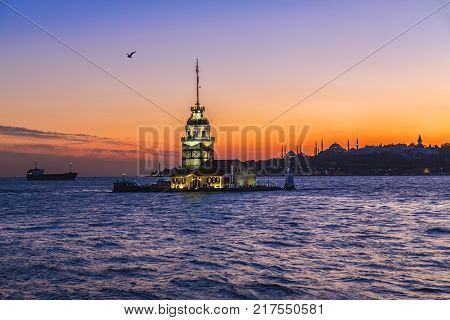 Wonderful sunset with Maiden's tower on Bosphorus and view of historical peninsula. Maiden's tower is one of landmarks of Istanbul Turkey
