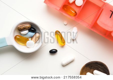Medicine Measured Out For A Daily Dose To Take Tablets