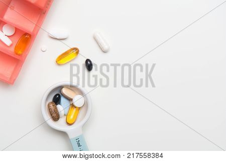 Medicine Measured Out For A Daily Dose To Take Tablets