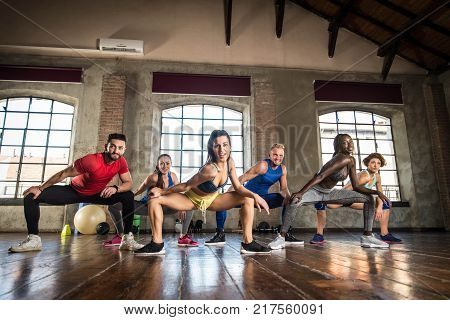 Athletes Training In A Gym