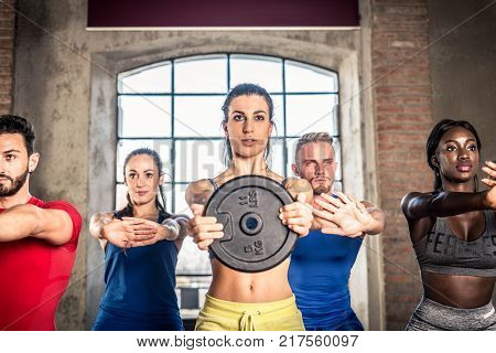 Athletes Training In A Gym
