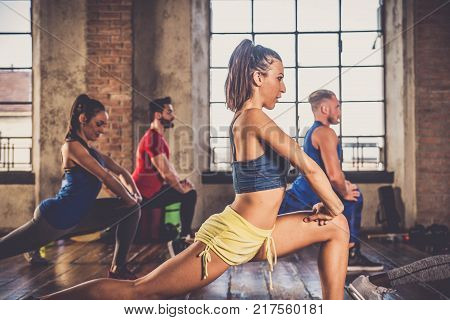 Athletes Training In A Gym