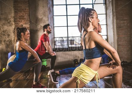 Athletes Training In A Gym