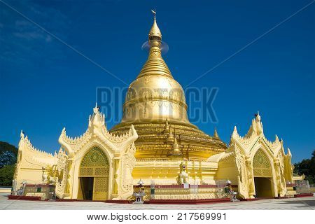 Buddhist temple of Maha Wizaya Pagoda close up in the sunny day. Yangon, Myanmar