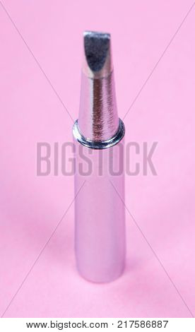 image of one Soldering tips on pink background