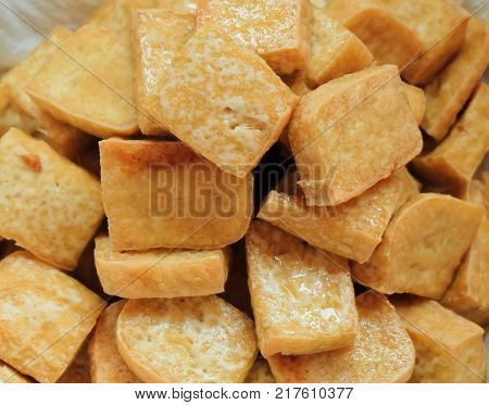 Cuisine and Food Chinese Deep Fried Tofu or Fried Bean Curd Usually Served with Sweet and Sour Spicy Sauce. High in Vitamin B9 B1 B2 and K.