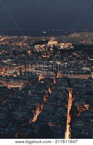 Athens skyline at night viewed from Mt Lykavitos with Acropolis, Greece.