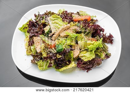 Caesar Salad, Salad with meat chicken, on a plate