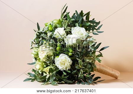 Beautiful wedding bunch with different flowers selective focus and blurred background