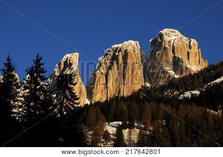 Beautiful view of Sassolungo (Langkofel) group in the Dolomites as seen from Campitello di Fassa. Val di Fassa, Italy