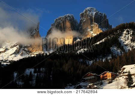 Beautiful view of Sassolungo (Langkofel) group in the Dolomites as seen from Campitello di Fassa. Val di Fassa, Italy
