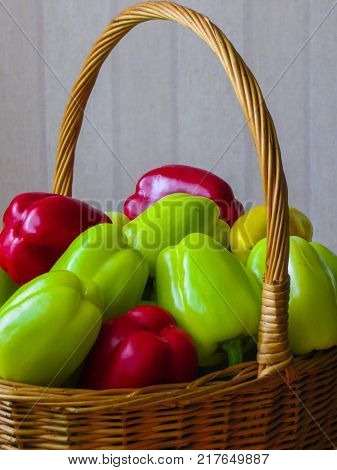 A whole basket full of colorful peppers.