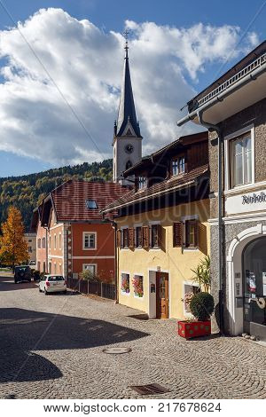GMUEND IN KAERNTEN/ AUSTRIA - OCTOBER 10, 2017. Historical center of Gmuend with the gothic parish church. Gmuend in Kaernten, district of Spittal an der Drau, federal state of Carinthia, Austria