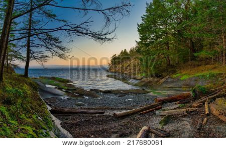 Scenic sunset panoramic view of the ocean overlooking at the Strait of Georgia from Jack Point and Biggs Park in Nanaimo, British Columbia.