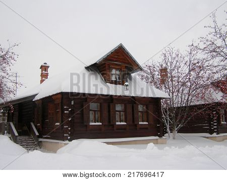 Old Wooden House In Winter In Suzdal, Russia