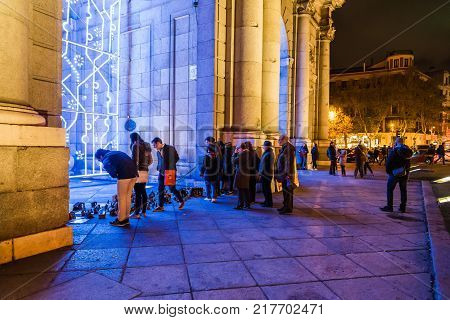 Madrid, Spain - December 8, 2017: Nativity scenes placed by anonymous people in Puerta de Alcala as the Mayor of Madrid, Manuela Carmena , has not allowed the traditional Nativity Scene