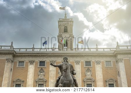 the bronze equestrian statue of Marco Aurelio (Marcus Aurelius) with the Campidoglio Palace in the distance in Rome