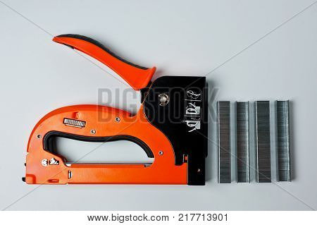 Stapler household new orange reliable with staples